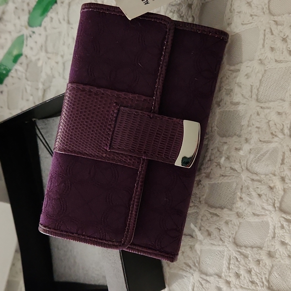 Alfani Grape wallet with snake skin trim.
